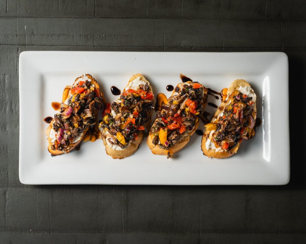 Roasted bell pepper and portobello bruschetta at The Ivy Steakhouse