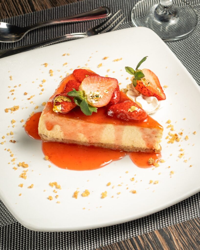 Signature cheesecake with strawberries at The Ivy Steakhouse